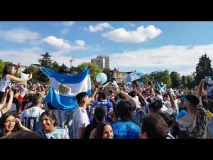 Argentina fans chanting "De la mano de Leo Messi!"